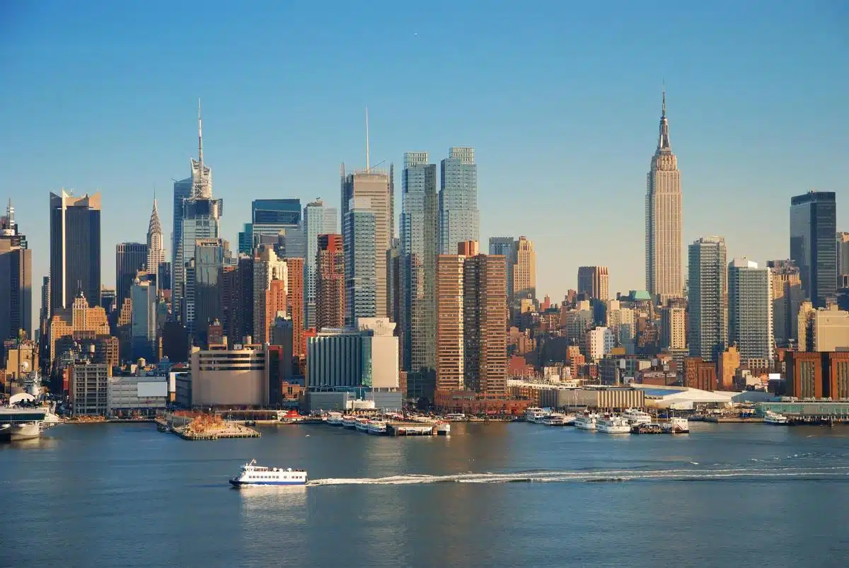 New York City skyline featuring skyscrapers and waterfront, representing tax law services in the state.