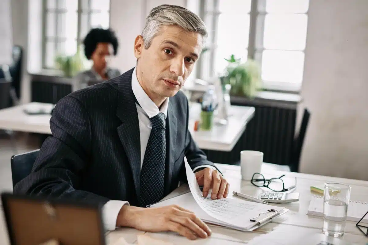 Experienced tax attorney in Arizona reviewing financial documents