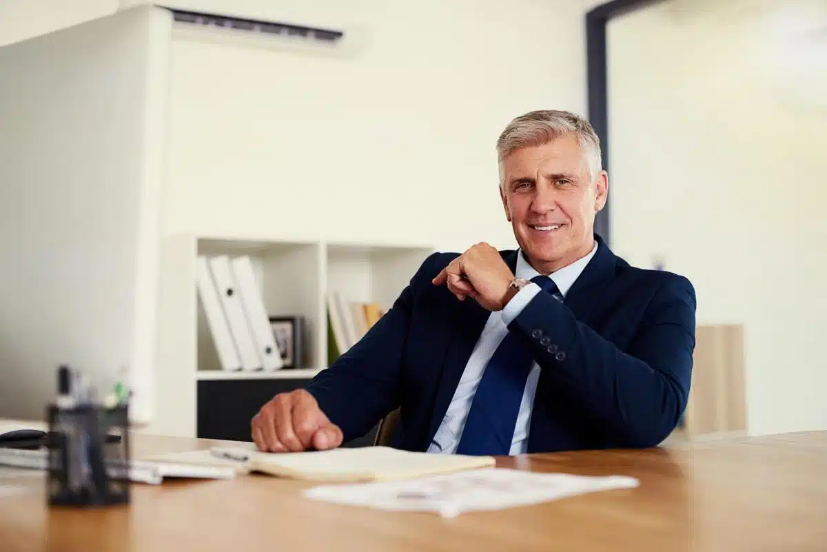 Professional tax lawyer in California sitting at his desk, ready to provide expert legal assistance for tax issues.