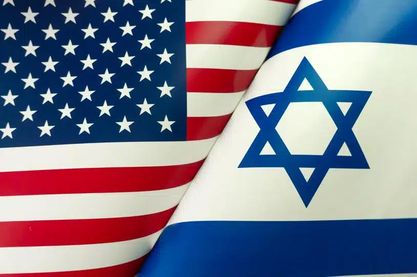Folded American & Israeli flags side by side.